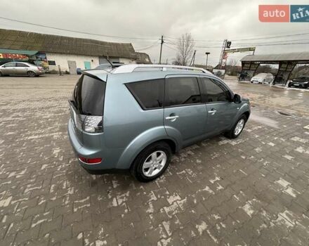 Зелений Міцубісі Аутлендер, об'ємом двигуна 2.36 л та пробігом 80 тис. км за 10500 $, фото 10 на Automoto.ua