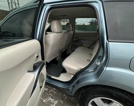 Зелений Міцубісі Аутлендер, об'ємом двигуна 2.36 л та пробігом 80 тис. км за 10500 $, фото 12 на Automoto.ua