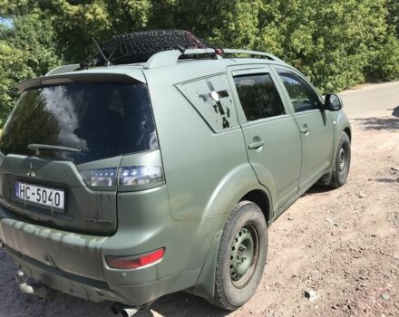 Зеленый Мицубиси Аутлендер, объемом двигателя 2 л и пробегом 317 тыс. км за 4000 $, фото 5 на Automoto.ua