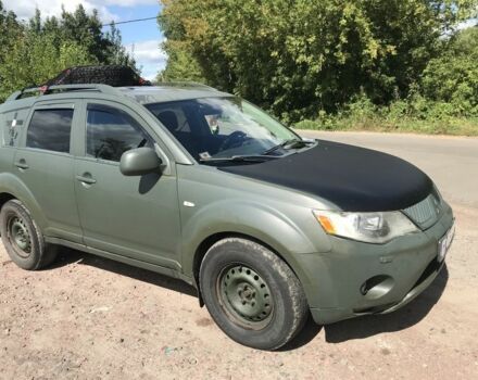 Зеленый Мицубиси Аутлендер, объемом двигателя 2 л и пробегом 317 тыс. км за 4000 $, фото 6 на Automoto.ua