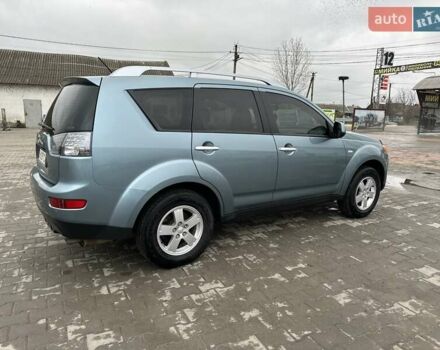 Зелений Міцубісі Аутлендер, об'ємом двигуна 2.36 л та пробігом 80 тис. км за 10500 $, фото 1 на Automoto.ua