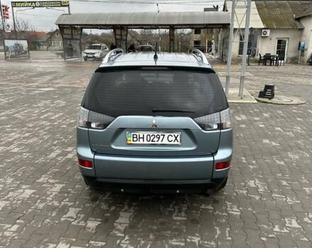 Зелений Міцубісі Аутлендер, об'ємом двигуна 2.36 л та пробігом 80 тис. км за 10500 $, фото 2 на Automoto.ua