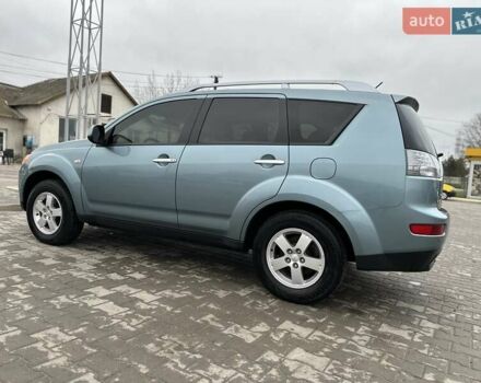 Зелений Міцубісі Аутлендер, об'ємом двигуна 2.36 л та пробігом 80 тис. км за 10500 $, фото 18 на Automoto.ua