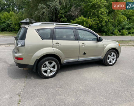 Зелений Міцубісі Аутлендер, об'ємом двигуна 2.4 л та пробігом 290 тис. км за 7000 $, фото 3 на Automoto.ua