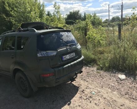 Зеленый Мицубиси Аутлендер, объемом двигателя 2 л и пробегом 317 тыс. км за 4000 $, фото 4 на Automoto.ua