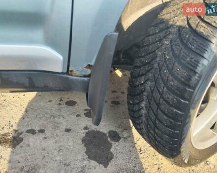 Зеленый Мицубиси Аутлендер, объемом двигателя 3 л и пробегом 235 тыс. км за 7000 $, фото 3 на Automoto.ua