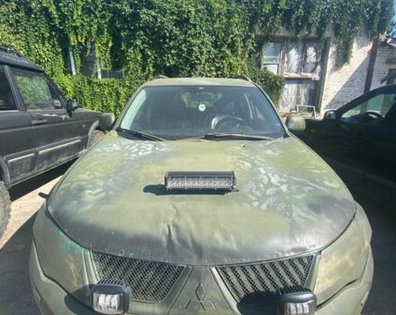 Зеленый Мицубиси Аутлендер, объемом двигателя 2 л и пробегом 400 тыс. км за 4271 $, фото 1 на Automoto.ua