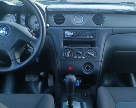 Зеленый Мицубиси Аутлендер, объемом двигателя 2.4 л и пробегом 220 тыс. км за 4000 $, фото 1 на Automoto.ua