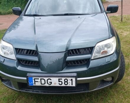 Зеленый Мицубиси Аутлендер, объемом двигателя 3 л и пробегом 220 тыс. км за 2700 $, фото 1 на Automoto.ua