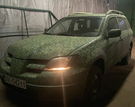 Зеленый Мицубиси Аутлендер, объемом двигателя 2 л и пробегом 240 тыс. км за 2500 $, фото 1 на Automoto.ua