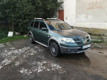 Зеленый Мицубиси Аутлендер, объемом двигателя 2.4 л и пробегом 3 тыс. км за 6500 $, фото 1 на Automoto.ua