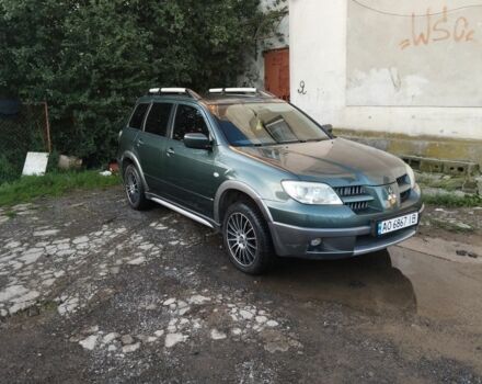 Зеленый Мицубиси Аутлендер, объемом двигателя 2.4 л и пробегом 3 тыс. км за 6500 $, фото 1 на Automoto.ua