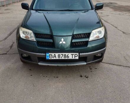 Зелений Міцубісі Аутлендер, об'ємом двигуна 2 л та пробігом 228 тис. км за 6200 $, фото 1 на Automoto.ua