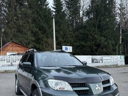 Мицубиси Аутлендер 2006 в Верховине на Automoto.ua Зеленый Мицубиси Аутлендер, объемом двигателя 2 л и пробегом 286 тыс. км за 6000 $, фото 1 на Automoto.ua