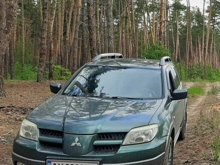 Мицубиси Аутлендер 2006 в Харькове на Automoto.ua Зеленый Мицубиси Аутлендер, объемом двигателя 2.4 л и пробегом 250 тыс. км за 5222 $, фото 1 на Automoto.ua