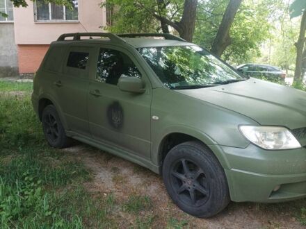 Мицубиси Аутлендер 2006 в Житомире на Automoto.ua Зеленый Мицубиси Аутлендер, объемом двигателя 2.4 л и пробегом 3 тыс. км за 4057 $, фото 1 на Automoto.ua