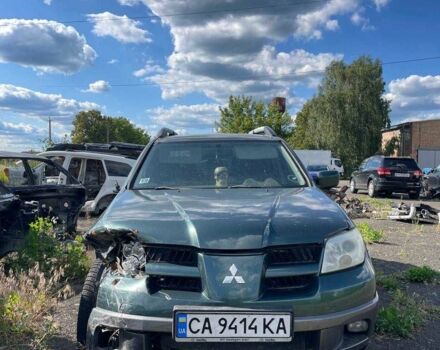 Зелений Міцубісі Аутлендер, об'ємом двигуна 2.4 л та пробігом 240 тис. км за 3000 $, фото 1 на Automoto.ua