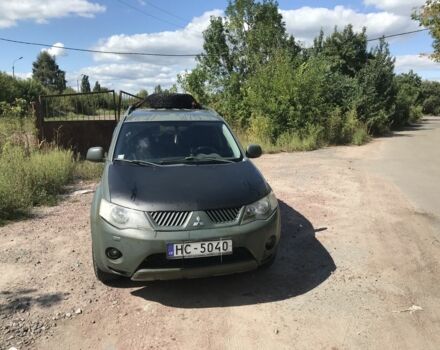 Зелений Міцубісі Аутлендер, об'ємом двигуна 2 л та пробігом 317 тис. км за 4700 $, фото 1 на Automoto.ua