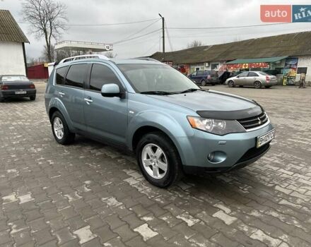 Зелений Міцубісі Аутлендер, об'ємом двигуна 2.36 л та пробігом 80 тис. км за 10500 $, фото 1 на Automoto.ua