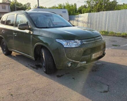 Зеленый Мицубиси Аутлендер, объемом двигателя 2.2 л и пробегом 340 тыс. км за 6900 $, фото 1 на Automoto.ua