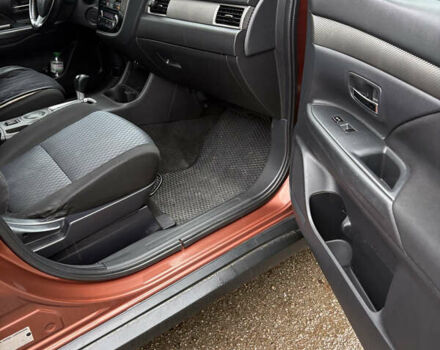 Оранжевый Мицубиси Аутлендер, объемом двигателя 2.36 л и пробегом 201 тыс. км за 10900 $, фото 14 на Automoto.ua