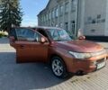 Оранжевый Мицубиси Аутлендер, объемом двигателя 2.36 л и пробегом 201 тыс. км за 10300 $, фото 27 на Automoto.ua