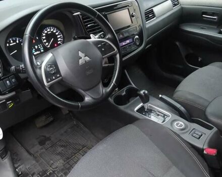Помаранчевий Міцубісі Аутлендер, об'ємом двигуна 2.4 л та пробігом 166 тис. км за 11700 $, фото 2 на Automoto.ua