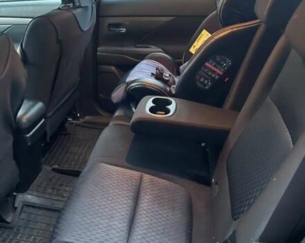 Оранжевый Мицубиси Аутлендер, объемом двигателя 2 л и пробегом 203 тыс. км за 14200 $, фото 3 на Automoto.ua