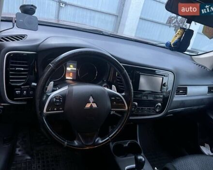 Оранжевый Мицубиси Аутлендер, объемом двигателя 2 л и пробегом 203 тыс. км за 14200 $, фото 2 на Automoto.ua