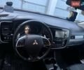 Оранжевый Мицубиси Аутлендер, объемом двигателя 2 л и пробегом 203 тыс. км за 14200 $, фото 2 на Automoto.ua