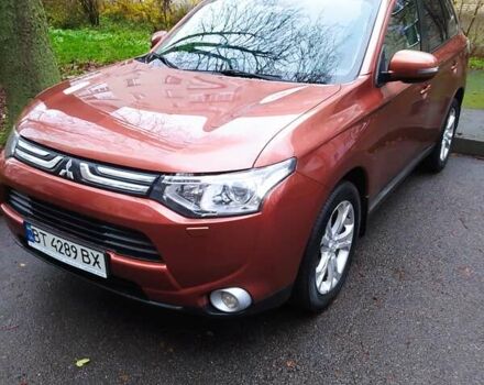Помаранчевий Міцубісі Аутлендер, об'ємом двигуна 2.4 л та пробігом 166 тис. км за 11700 $, фото 7 на Automoto.ua