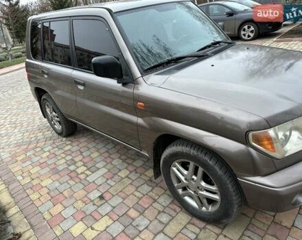 Бежевий Міцубісі Паджеро Пінін, об'ємом двигуна 1.83 л та пробігом 264 тис. км за 5750 $, фото 9 на Automoto.ua