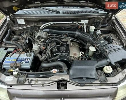 Бежевий Міцубісі Паджеро Пінін, об'ємом двигуна 1.83 л та пробігом 264 тис. км за 5750 $, фото 33 на Automoto.ua