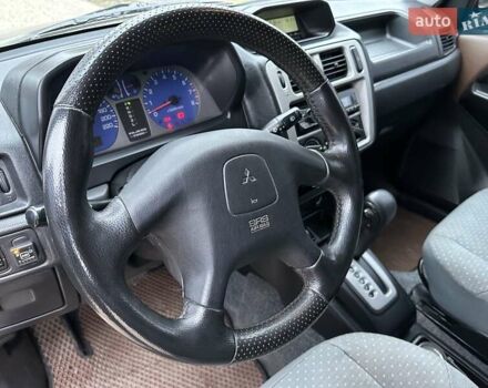 Бежевий Міцубісі Паджеро Пінін, об'ємом двигуна 1.83 л та пробігом 264 тис. км за 5750 $, фото 31 на Automoto.ua