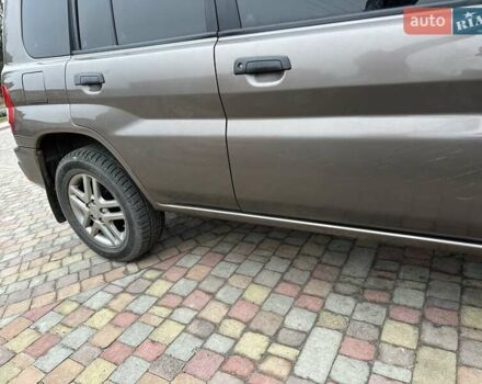 Бежевий Міцубісі Паджеро Пінін, об'ємом двигуна 1.83 л та пробігом 264 тис. км за 5750 $, фото 10 на Automoto.ua