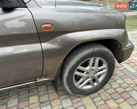 Бежевий Міцубісі Паджеро Пінін, об'ємом двигуна 1.83 л та пробігом 264 тис. км за 5750 $, фото 11 на Automoto.ua