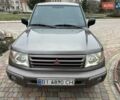 Бежевий Міцубісі Паджеро Пінін, об'ємом двигуна 1.83 л та пробігом 264 тис. км за 5750 $, фото 1 на Automoto.ua