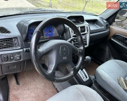 Бежевий Міцубісі Паджеро Пінін, об'ємом двигуна 1.83 л та пробігом 264 тис. км за 5750 $, фото 22 на Automoto.ua