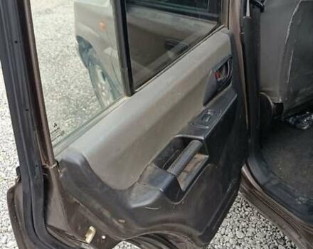 Коричневый Мицубиси Паджеро Пинин, объемом двигателя 1.83 л и пробегом 238 тыс. км за 2700 $, фото 7 на Automoto.ua