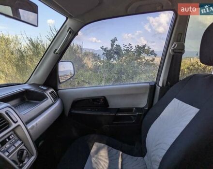 Зеленый Мицубиси Паджеро Пинин, объемом двигателя 1.83 л и пробегом 270 тыс. км за 4900 $, фото 13 на Automoto.ua