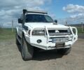 Белый Мицубиси Паджеро Спорт, объемом двигателя 2.48 л и пробегом 260 тыс. км за 9500 $, фото 1 на Automoto.ua