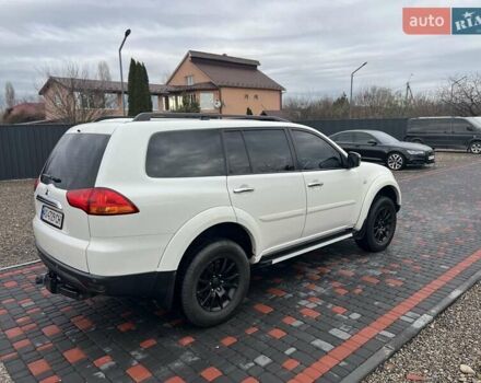 Білий Міцубісі Паджеро Спорт, об'ємом двигуна 2.5 л та пробігом 158 тис. км за 13200 $, фото 13 на Automoto.ua