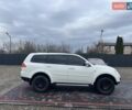 Білий Міцубісі Паджеро Спорт, об'ємом двигуна 2.48 л та пробігом 158 тис. км за 13000 $, фото 5 на Automoto.ua