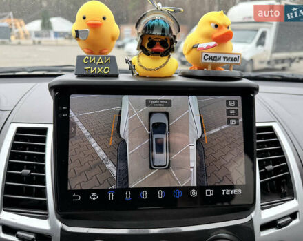 Білий Міцубісі Паджеро Спорт, об'ємом двигуна 2.48 л та пробігом 230 тис. км за 13500 $, фото 31 на Automoto.ua