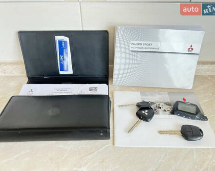 Белый Мицубиси Паджеро Спорт, объемом двигателя 2.5 л и пробегом 59 тыс. км за 22500 $, фото 7 на Automoto.ua