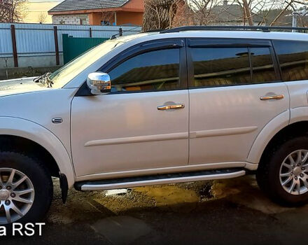 Белый Мицубиси Паджеро Спорт, объемом двигателя 2.5 л и пробегом 162 тыс. км за 16500 $, фото 6 на Automoto.ua