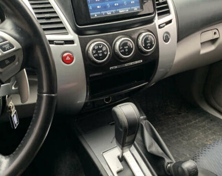 Білий Міцубісі Паджеро Спорт, об'ємом двигуна 2.48 л та пробігом 256 тис. км за 12600 $, фото 11 на Automoto.ua