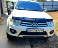 Белый Мицубиси Паджеро Спорт, объемом двигателя 2.5 л и пробегом 167 тыс. км за 17000 $, фото 1 на Automoto.ua