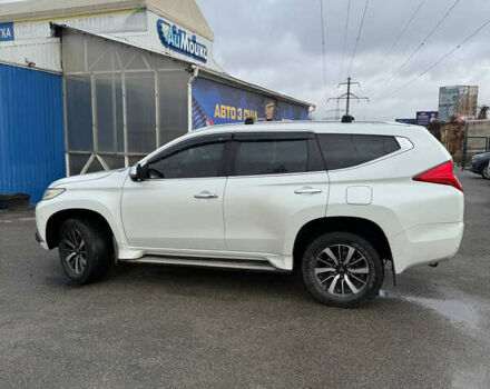 Белый Мицубиси Паджеро Спорт, объемом двигателя 2.4 л и пробегом 290 тыс. км за 16300 $, фото 5 на Automoto.ua