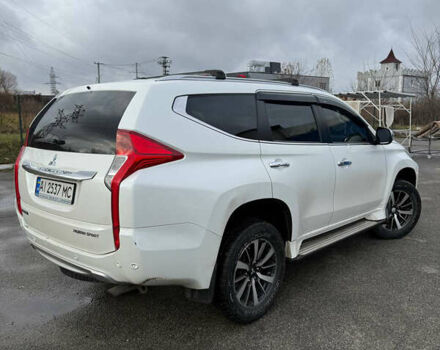 Белый Мицубиси Паджеро Спорт, объемом двигателя 2.4 л и пробегом 290 тыс. км за 16300 $, фото 2 на Automoto.ua